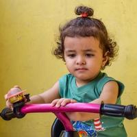 Cute little boy Shivaay driving cycle at home balcony during summer time, Sweet little boy photoshoot during day light, Little boy enjoy cycling at home during photo shoot