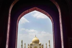 The Taj Mahal is an ivory-white marble mausoleum on the south bank of the Yamuna river in the Indian city of Agra, Uttar Pradesh, Taj Mahal, Agra, Uttar Pradesh, India, sunny day view photo