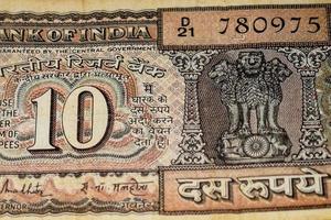 Close up view of rare ten rupee note on the table, Old Indian Currency notes on a rotating table, Rare Indian Currency close up view photo