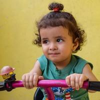 Cute little boy Shivaay driving cycle at home balcony during summer time, Sweet little boy photoshoot during day light, Little boy enjoy cycling at home during photo shoot