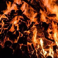 Fire flames on black background, Blaze fire flame texture background, Beautifully, the fire is burning, Fire flames with wood and cow dung bonfire photo