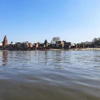 Yamuna River view from the boat in the day at Vrindavan, Krishna temple Kesi Ghat on the banks of the Yamuna River in the town of Vrindavan, Boating at Yamuna River Vrindavan photo