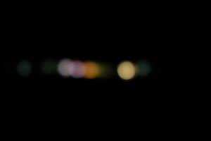 luz abstracta en el bokeh de la ciudad y luces desenfocadas, fondo borroso nocturno foto