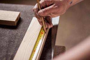 Close up of  carpenter tools on the table in wokshop, woodworking tools photo