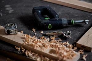 Close up of  carpenter tools on the table in wokshop, woodworking tools photo