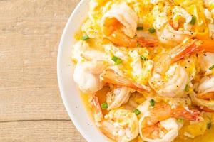 creamy omelet with shrimps or scrambled eggs and shrimps