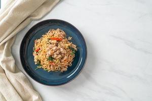 stir-fried instant noodles with basil and minced pork photo