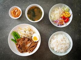 stir-fry Teriyaki Pork with sesame seeds ,mung bean sprouts, boiled egg and rice set photo