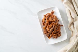 Sun-Dried Pork on white plate photo