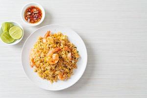 fried shrimps fried rice on plate photo