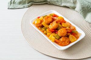 Stir-fried sweet and sour with fried shrimp photo