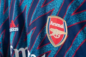 Bangkok, Thailand - Jan 18, 2022 - Arsenal logo on Arsenal shirt third jersey season 2021-2022 photo