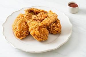 fried chicken with ketchup on plate
