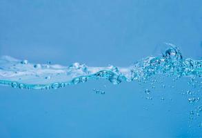 Water and air bubbles over white background with space for text photo