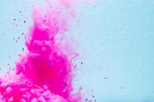 Color ink drop in water. Abstract background photo