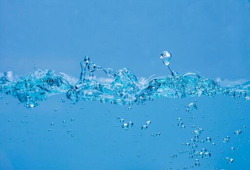 Water and air bubbles over white background with space for text photo