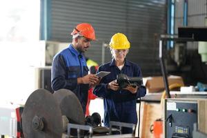 Professional men engineer worker skills quality, maintenance, training industry factory worker , warehouse Workshop for factory operators, mechanical engineering team production. photo