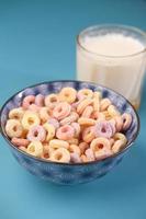 close up of colorful cereal corn flakes in a bowl photo