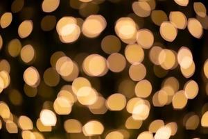 Fondo de bokeh de luz de Navidad borrosa abstracta. foto