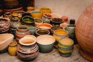 Hand made ceramic tableware, Collection of colorful clay pottery ceramics. photo