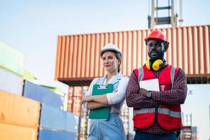 Foreman checking containers in the terminal, at import and export business logistic company. photo