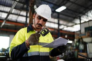 Professional men engineer worker skills quality, maintenance, training industry factory worker , warehouse Workshop for factory operators, mechanical engineering team production. photo