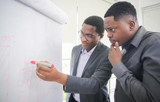 Group of business people discussing and giving ideas photo