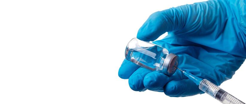 mano sosteniendo viola con vacuna contra el virus de la corona. foto