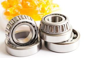 Grease and ball bearing, lithium machinery lubrication for automotive and industrial.