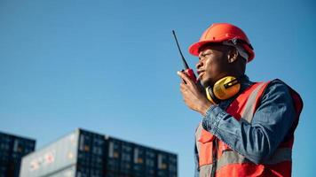 Industry worker control loading containers in the container terminal photo