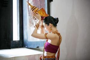 Asia woman wearing traditional Thai dress,The costume of the national dress of ancient Thailand. photo