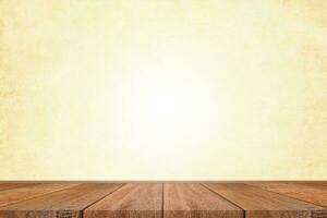 Empty of wooden floor on light yellow pastel color background. For your product display or design. photo