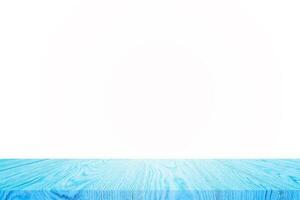 Empty blue wooden table top on white background. For product display or design. photo