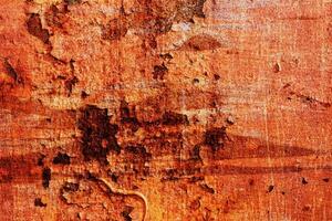 textura abstracta de metal oxidado. una pared de metal oxidado agrietado. fondo para el diseño foto