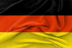 Fabric wavy texture national flag of Germany. photo