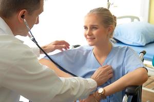 Doctor and patient in hospital photo