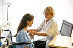 Doctor and patient in hospital photo