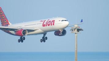 Airbus 330 approaching over ocean video