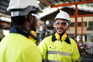 Professional men engineer worker skills quality, maintenance, training industry factory worker , warehouse Workshop for factory operators, mechanical engineering team production. photo