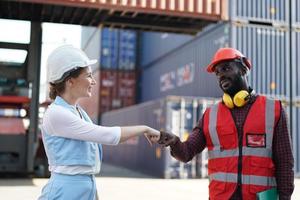 foreman checking containers in the terminal, at import and export business logistic company. photo