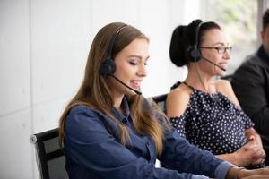 Service Team Concept. Operator or Contact Center Sale in Office, Information People Call Center, Quality Professional Team Sales Support Office. Environment Workplace Representative Company. photo