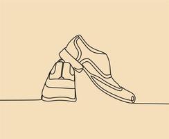 dibujo de línea continua en los zapatos vector