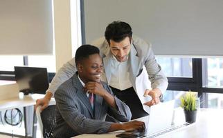 Group of business people collaborating in office or Multiethnic business people in meeting. photo