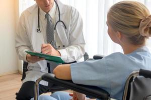 Doctor and patient in hospital photo