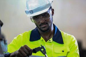 Professional men engineer worker skills quality, maintenance, training industry factory worker , warehouse Workshop for factory operators, mechanical engineering team production. photo