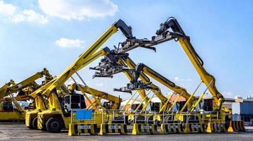 Container loading in a Cargo freight ship with industrial crane. Container ship in import and export business logistic company. Industry and Transportation concept. photo