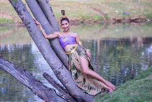 Asia woman wearing traditional Thai dress,The costume of the national dress of ancient Thailand. photo