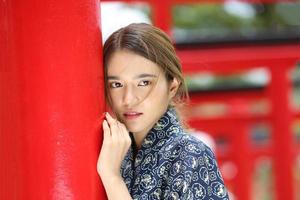 Young Asian girl wearing kimono, Japanese traditional clothes. photo