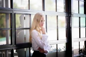 portrait of Young attractive woman on a summer day photo