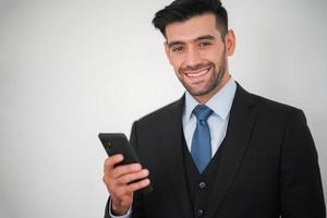 Elegant young caucasian handsome man on White background, Studio fashion portrait. photo